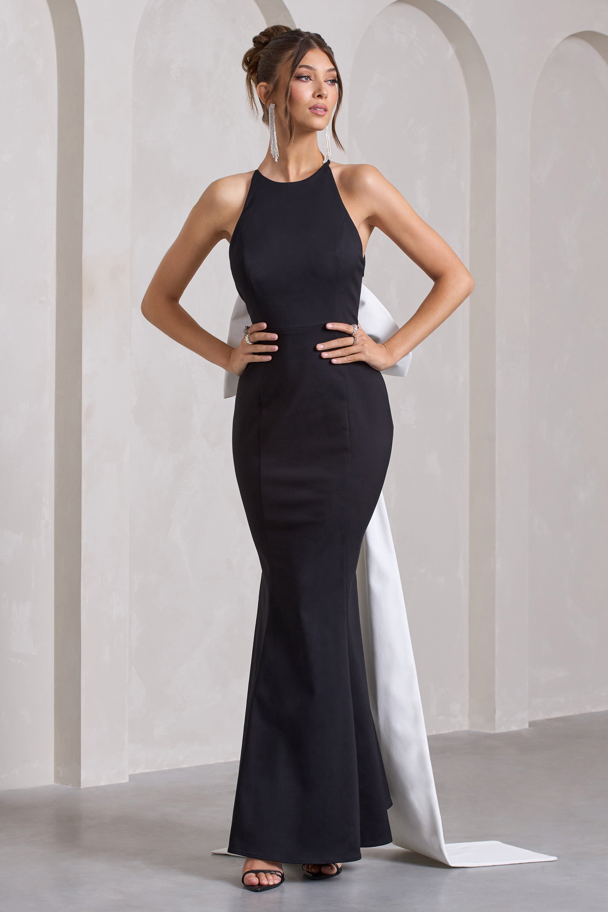 Bestow | Black Open-Back Maxi Dress With Oversized White Bow
